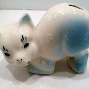 Antique Blue Cat Figurine Perfume Diffusers. Sometimes listed as Antique Toothbrush or toothpick Holder, however it was likely originally made as perfume diffusers
