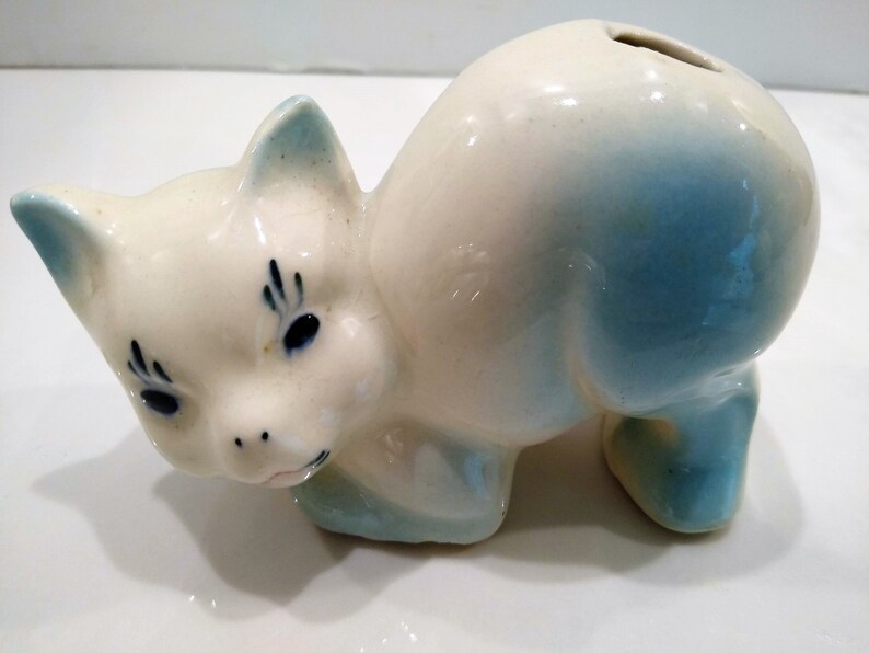 Antique Blue Cat Figurine Perfume Diffusers. Sometimes listed as Antique Toothbrush or toothpick Holder, however it was likely originally made as perfume diffusers