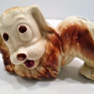 Antique Long haired Dog Figurine Perfume Diffusers. Sometimes listed as Antique Toothbrush or toothpick Holder, however it was likely originally made as perfume diffusers