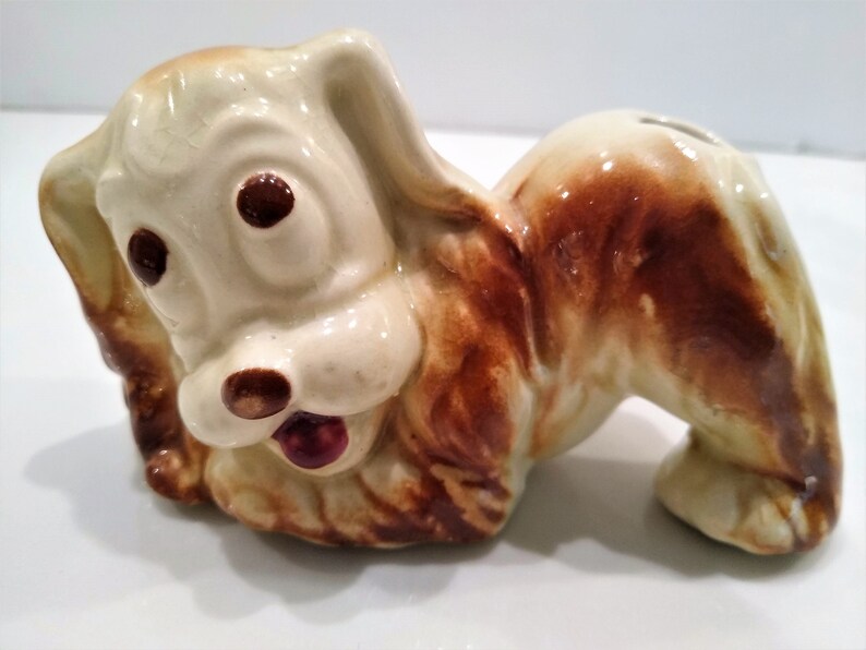 Antique Long haired Dog Figurine Perfume Diffusers. Sometimes listed as Antique Toothbrush or toothpick Holder, however it was likely originally made as perfume diffusers