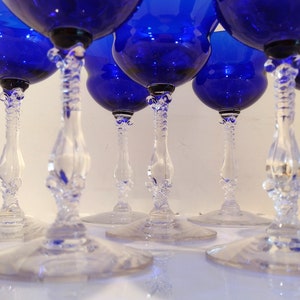 Set of 7 Antique Cobalt Royal Blue 3126 Cambridge Glass Champagne / Tall Sherbet Stemware.  Beautiful, clear cobalt blue art deco style angular flare top on a bulbous, bulging bowl with graceful foliated clear glass tall stems.