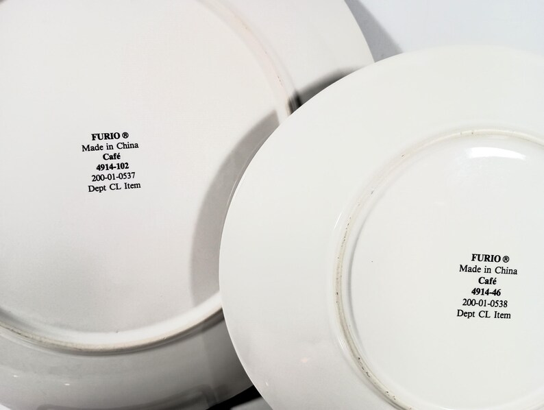 Furio Café salad plates showing underside backstamp on salad and dinner plates