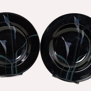 Set of 2 Mikasa Galleria Opus Black five piece place setting. Mystical Calla Lilys on black soup bowls.