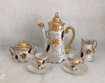 German Porcelain Chocolate Set with Pearlized Glaze, Raised Gold, Applied Florals
