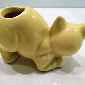 Antique Yellow Cat Figurine Perfume Diffusers. Sometimes listed as Antique Toothbrush or toothpick Holder, however it was likely originally made as perfume diffusers