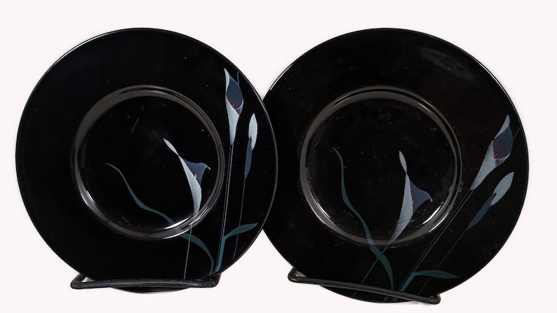 Set of 2 Mikasa Galleria Opus Black five piece place setting. Mystical Calla Lilys on black saucers