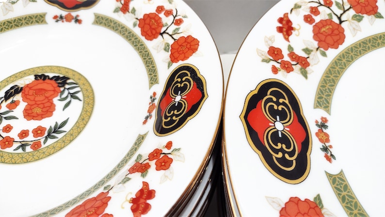 Lilily Cakara Dinnerware set, service for 8 Dinner plartes, salad plates, Soup Bowl, cup and saucer. Also Large oval platter, vegetable bowl and Covered Sugar (1)