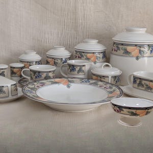 Mikasa Garden Harvest CAC29 stoneware pasta bowl, cup and saucer set serving pieces, sherbet,  and canister set with fruit and leaf border on cream glaze.