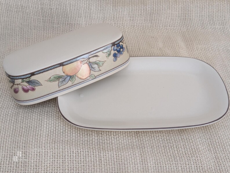 Mikasa Garden Harvest CAC29 stoneware Covered Butter with fruit and leaf border on cream glaze.