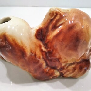 Antique Long haired Dog Figurine Perfume Diffusers. Sometimes listed as Antique Toothbrush or toothpick Holder, however it was likely originally made as perfume diffusers