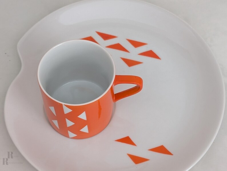 Jonas Roberts Japan snack set with white yin yang snack plate with orange diamonds and orange cup with white diamond pattern