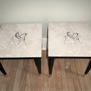 Mid-Century Formica top BOHO Stacking occasional accent end tables with Formica top with symbolic Symbol of The Winged Bull or Oxen