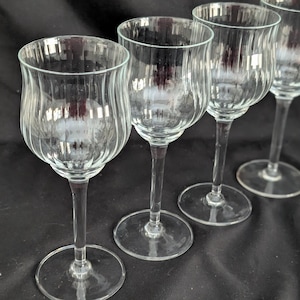 May include: A rustic wooden sign with the text "Welcome to our home" in a handwritten style. The sign features a distressed finish and a simple, inviting design, perfect for a front porch or entryway.