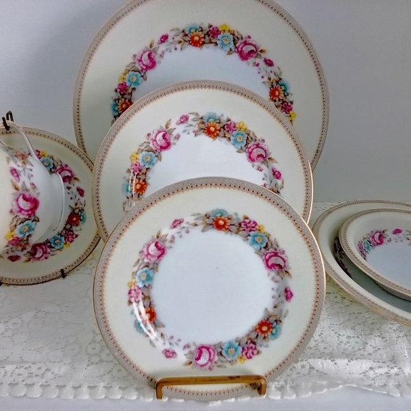 Jyoto Occupied Japan China Dinnerware. Wreaths of multi colored flowers, ivory band, gold trim. Place Settings, sets, and serving pieces