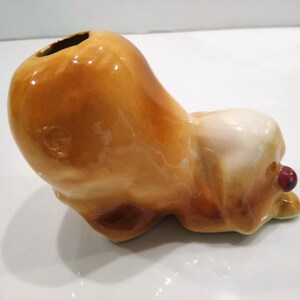 Antique Long haired Dog Figurine Perfume Diffusers. Sometimes listed as Antique Toothbrush or toothpick Holder, however it was likely originally made as perfume diffusers