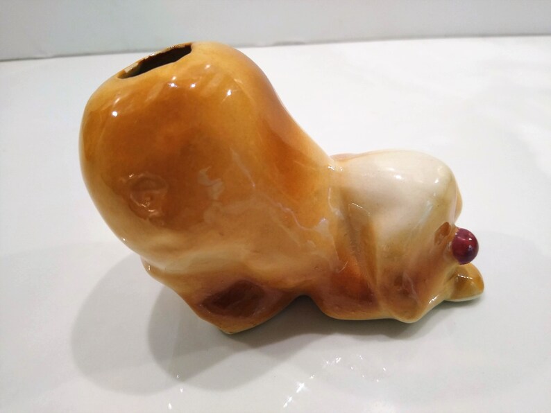 Antique Long haired Dog Figurine Perfume Diffusers. Sometimes listed as Antique Toothbrush or toothpick Holder, however it was likely originally made as perfume diffusers