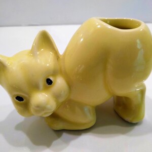 Antique Yellow Cat Figurine Perfume Diffusers. Sometimes listed as Antique Toothbrush or toothpick Holder, however it was likely originally made as perfume diffusers