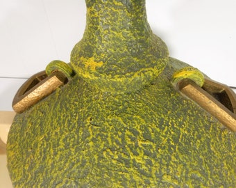 Water Vessel Table Lamp has a Brutalist. Heavy textured Green with gold tone handles. SHADE NOT INCLUDED