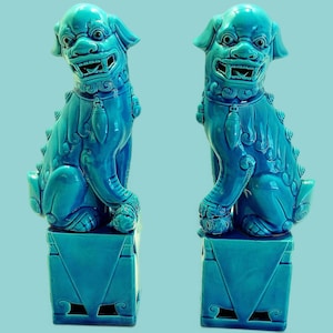 Turquoise Chinese guardian shishi lions or foo dogs, stamped, interior glazed Male and Female