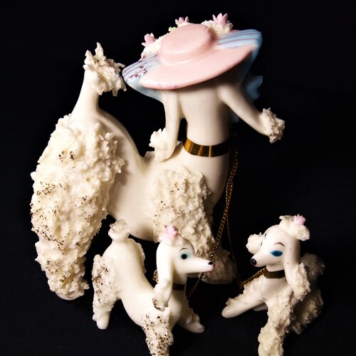Mid Century ArnArt shops Spaghetti Porcelain Poodle Trio. White mother poodle with 2 poodle puppies.
