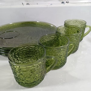 Mid Century Anchor Hocking Avocado Soreno Design Snack Luncheon Set in Original Display box. Textured Avocado green bark pressed glass luncheon snack plates and small 5 ounce tea or coffee cups.