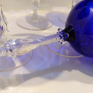 Set of 7 Antique Cobalt Royal Blue 3126 Cambridge Glass Champagne / Tall Sherbet Stemware.  Beautiful, clear cobalt blue art deco style angular flare top on a bulbous, bulging bowl with graceful foliated clear glass tall stems.