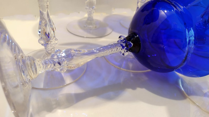 Set of 7 Antique Cobalt Royal Blue 3126 Cambridge Glass Champagne / Tall Sherbet Stemware.  Beautiful, clear cobalt blue art deco style angular flare top on a bulbous, bulging bowl with graceful foliated clear glass tall stems.