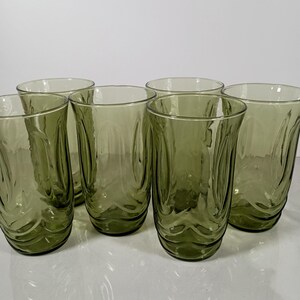 Set of 6 Vintage Anchor Hocking avodaco green tumblers. 5 1/4 inch tall glasses molded into the shape to  represent tulip blossoms.