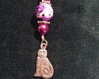 Contemporary cat zipper pull in purple