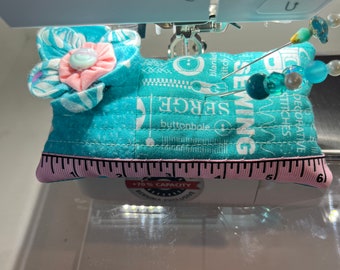 Teal and pink with flower sewing/quilting pin cushion