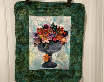Hand-Dyed and Batik fabric flowers in a champagne glass Quilted Wall-Hanging