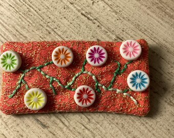 Sunny orange sparkly floral pin brooch