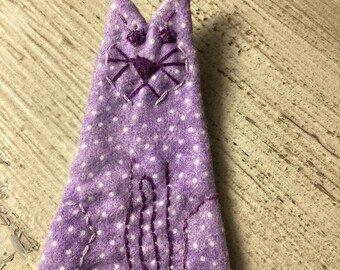 Meow in purple flannel