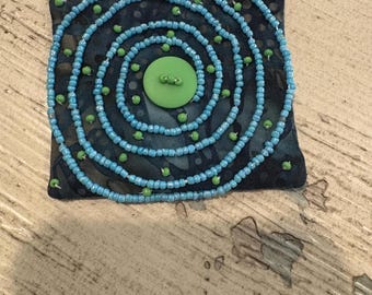 Spiral trail pin brooch