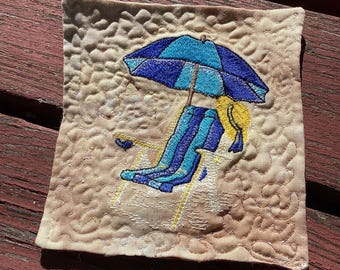 Beachy mug rug, coaster, machine embroidered