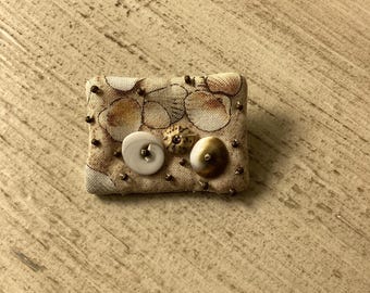 Tiny shell pin brooch
