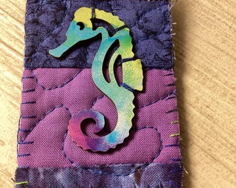 Sea horse at the sea shore pin brooch