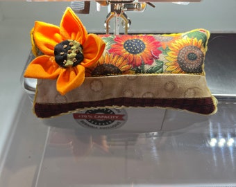 Vivid orange flower pin cushion