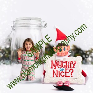 May include: A young person wearing Christmas pajamas inside a large glass jar. An elf figure holds a sign that reads "NAUGHTY OR NICE?" The scene is set against a snowy background with snowflakes.