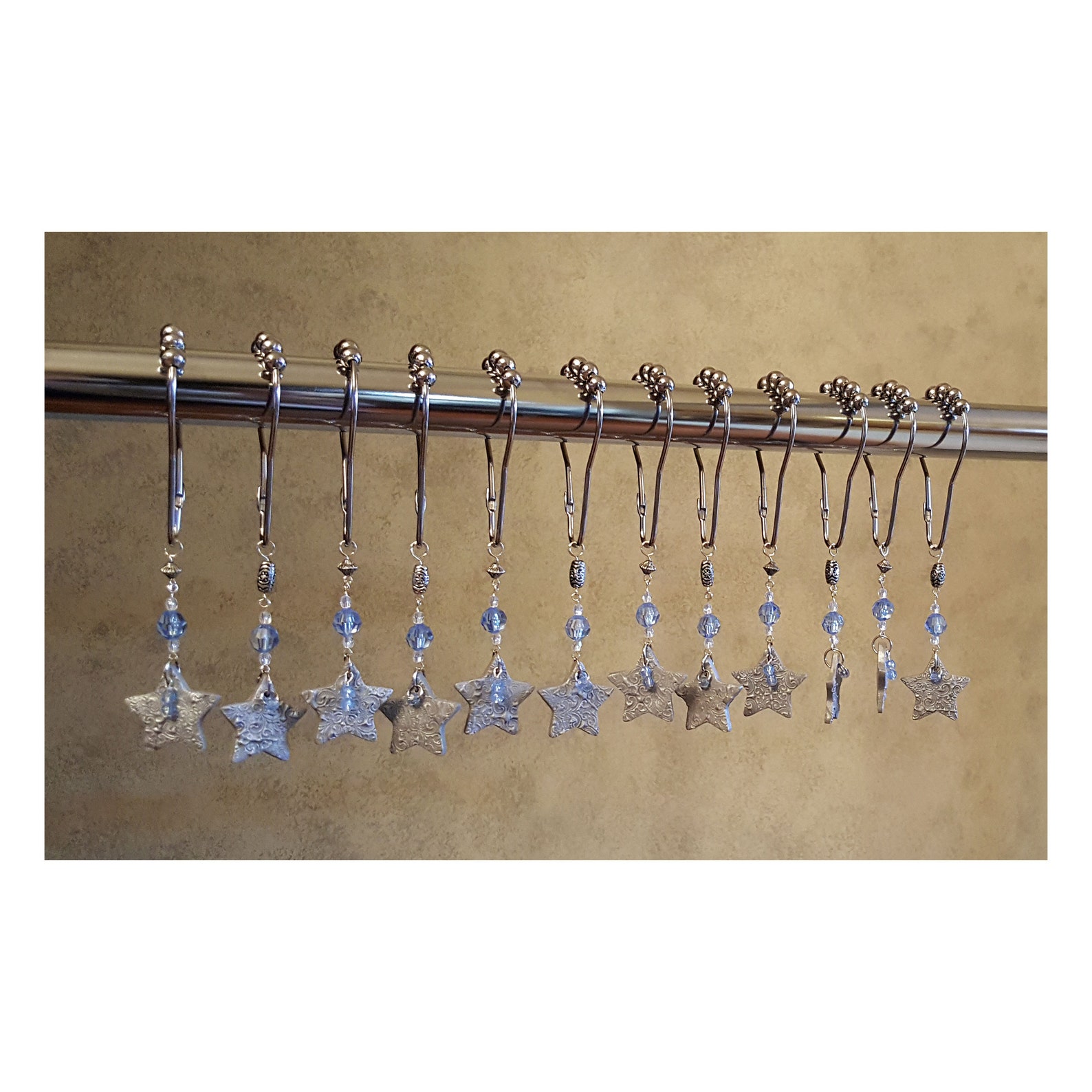 Decorative Shower Curtain Hooks.. Silver Stars With Light Sapphire