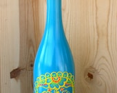 Day of the Dead Wine bottle Vase, Up Cycled, Brightly colored, Turquoise, yellow, green and orange