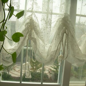 Combo Price: One Fairy Tale Shabby Large Rod Pocket/Pinch Pleated White Pull-up Sheer Panel + One Drawnwork WHITE Balloon Curtain