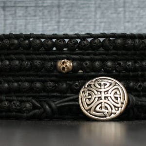 wrap bracelet- silver skulls and black lava on black leather