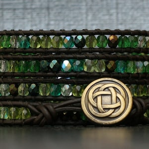 wrap bracelet- mixed green crystal on black brown leather - boho glam gypsy bohemian - emerald - celtic jewelry