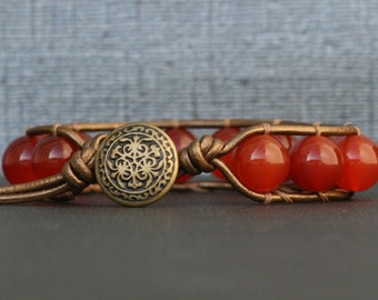 carnelian bracelet - single wrap on bronze leather - bronze button - red orange gemstone bracelet - mens or womens - boho bohemian jewelry