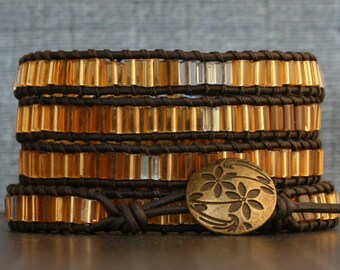 caramel brown and gold on black brown leather - beaded tile wrap bracelet - warm colors - metallic