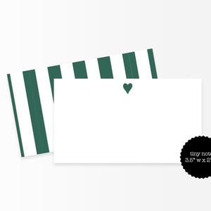 May include: White note cards with a green heart and a striped envelope. The note cards are 3.5" x 2" and are labeled "tiny note". The envelope has green and white stripes.