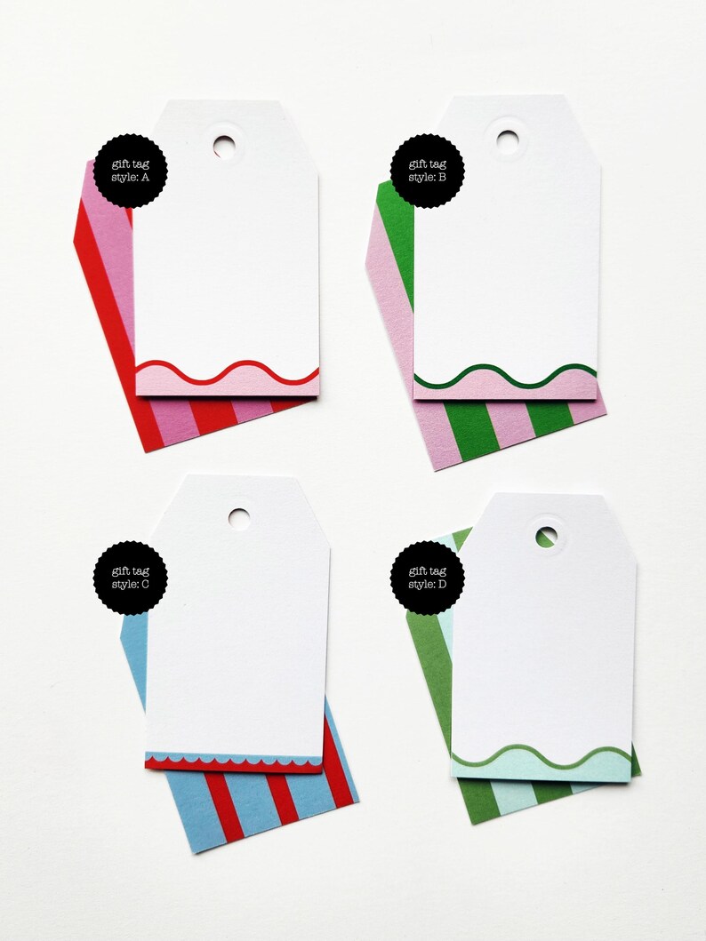 May include: Four white gift tags with scalloped or wavy edges and colorful striped accents. Each tag has a black circular label with the text "gift tag style: A, B, C, or D". The tags are designed for gift giving.