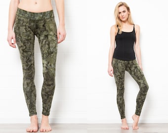 May include: Green and brown tie-dye leggings with a wide waistband.