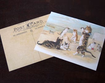 Reproduction vintage de carte postale de plage avec chat, chaton d'été antique, courrier postal vacances sur l'océan